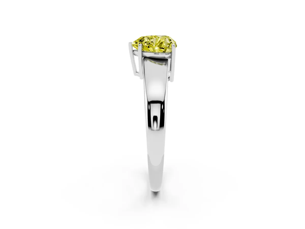 Fancy Yellow Heart Cut Solitaire Diamond Ring with Tapered Band and Four-Prong Setting Silver