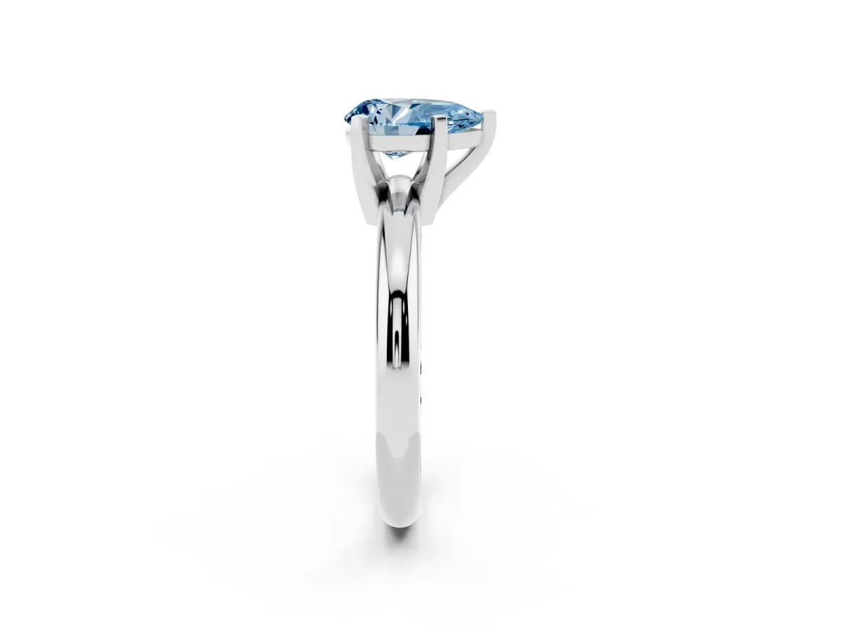 Fancy Blue Pear Cut Diamond Solitaire Engagement Ring with Round Band and Four-Prong Setting Silver