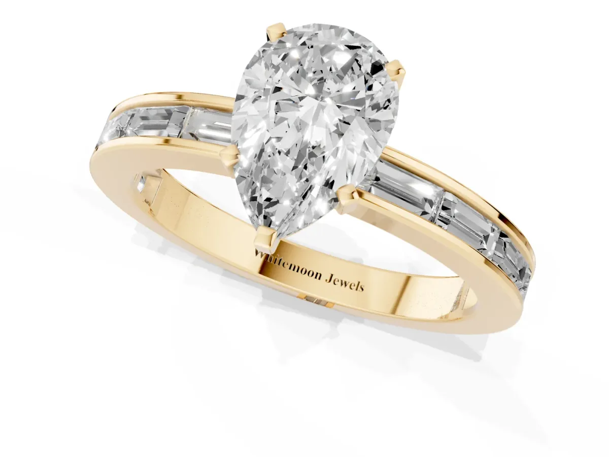 Pear Cut Solitaire Diamond Ring with Channel-Set Baguette Band and Four-Prong Setting Yellow gold