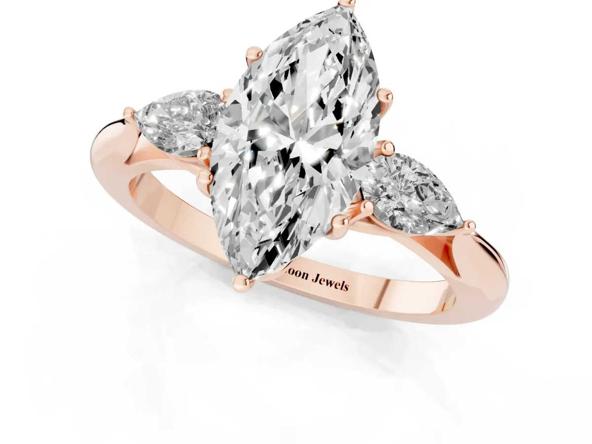 Three-Stone Marquise Cut Brilliant Diamond Solitaire Ring with Tapered Band and Four-Prong Setting Rose gold