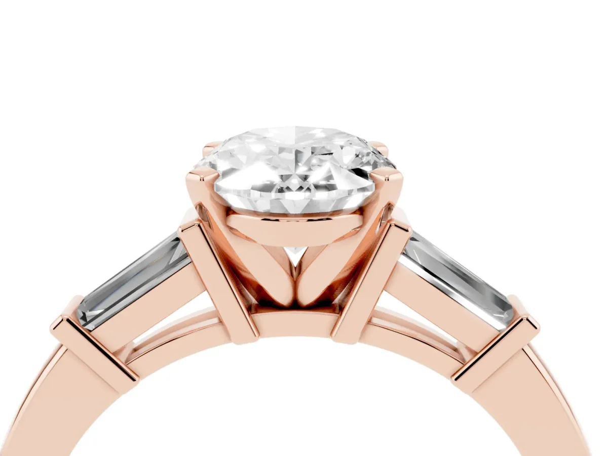 Oval Cut Cut Diamond Solitaire Ring with Tapered Baguette Accents and Four-Prong Setting Rose gold