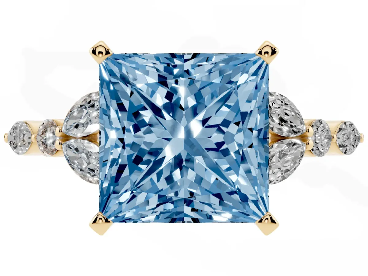 Fancy Blue Princess Cut Diamond Solitaire Ring with Side Stones and Four-Prong Setting Yellow gold