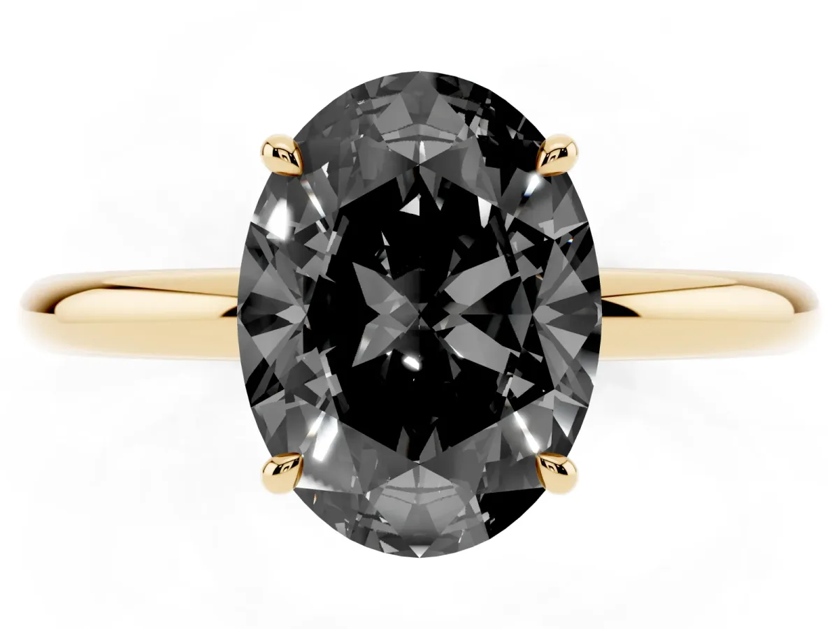 Fancy Black Oval Cut Diamond Solitaire Ring with Thin Band and Four-Prong Setting Yellow gold