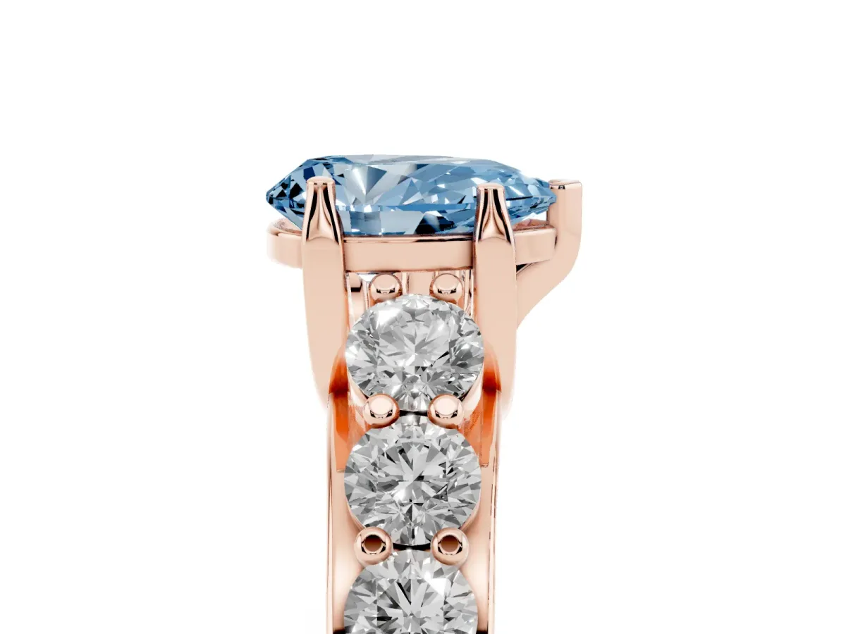 Fancy Blue Pear Cut Diamond Engagement Ring with Pavé Band and Four-Prong Setting Rose gold