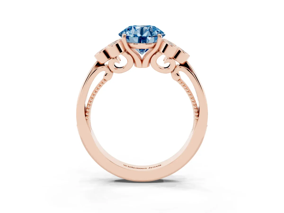 Fancy Blue Round Cut Cut Diamond Engagement Ring with Bezel Set Round Side Stones and Prong Setting Rose gold