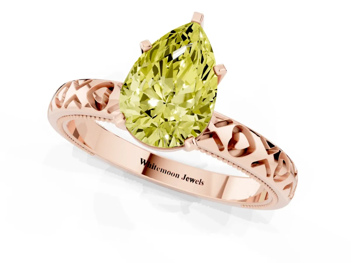 Fancy Yellow Pear Cut Solitaire Diamond Engagement Ring with XO Engraved Band and Four-Prong Setting Rose gold