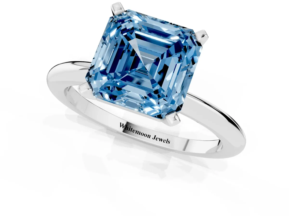 Fancy Blue Asscher Cut Diamond Solitaire Ring with Prong Setting and Classic Band Platinum