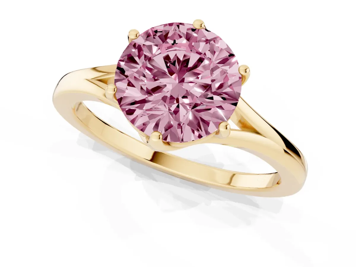 Fancy Pink Round Cut Solitaire Diamond Ring with Six-Prong Setting and Tapered Band Yellow gold
