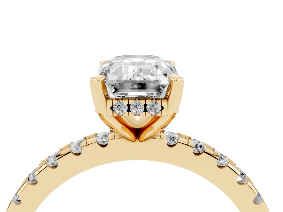 Emerald Cut Diamond Solitaire Ring with Round Pavé Band and Four-Prong Setting Yellow gold