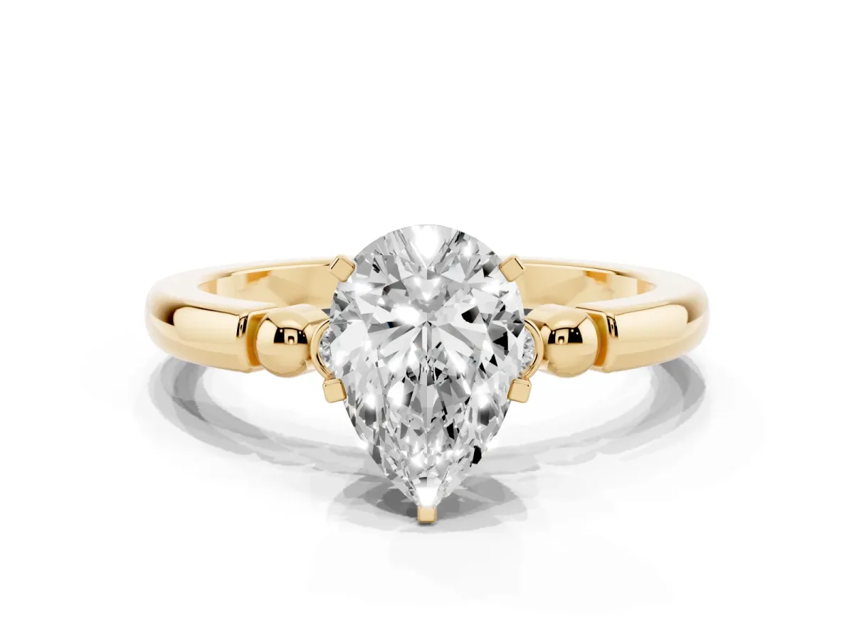 Pear Cut Solitaire Beaded Band with Four-Prong Setting Yellow gold