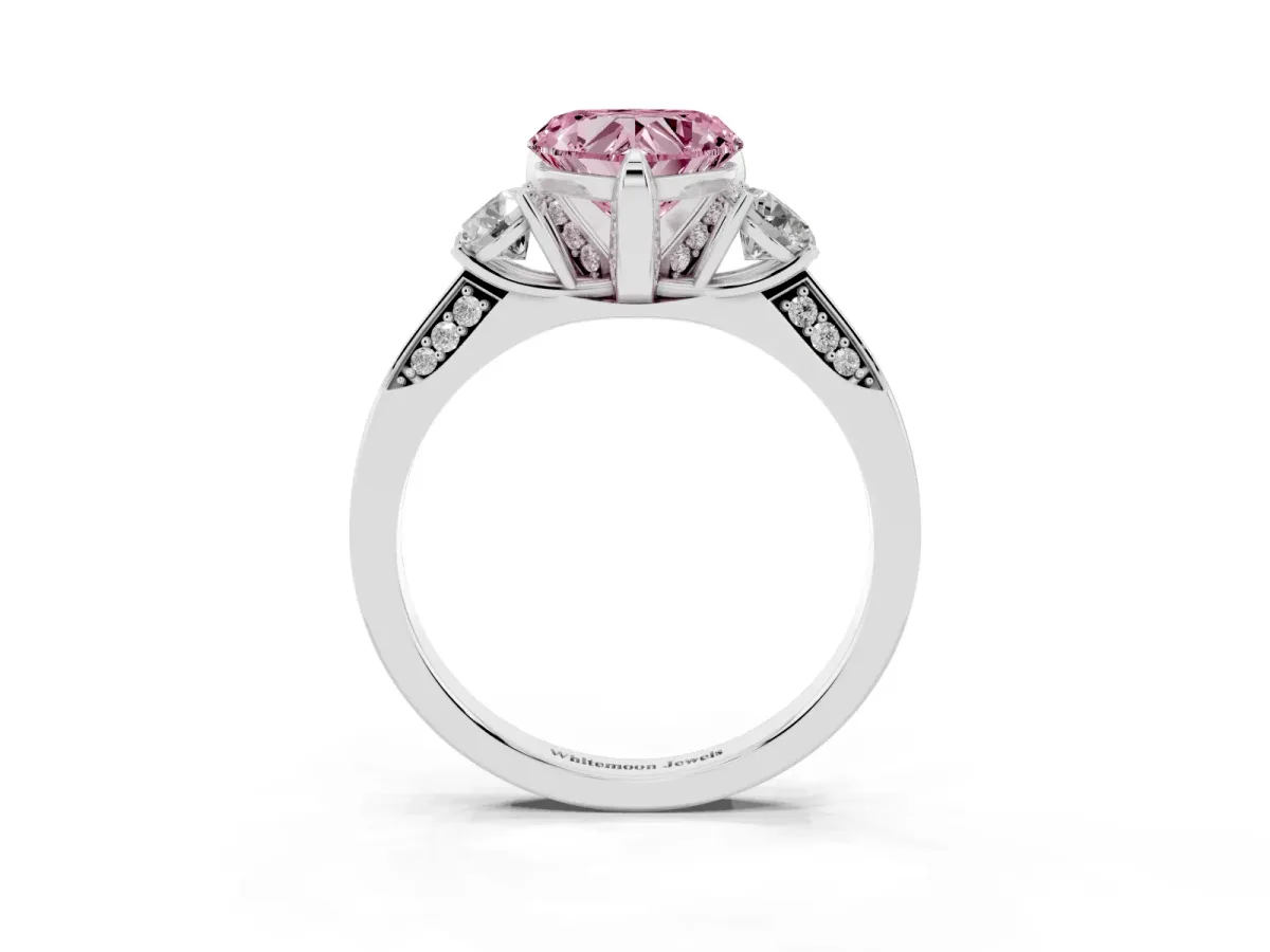Fancy Pink Heart Cut Brilliant Three-Stone Diamond Ring with Pavé Band and Four-Prong Setting White gold