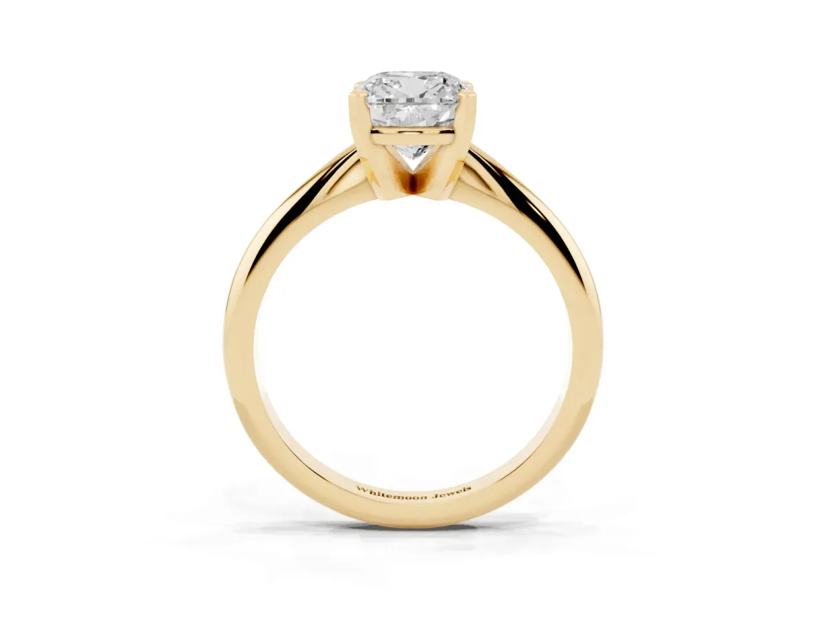 Cushion Cut Cut Solitaire Ring with Four-Prong Setting on a Classic Band Yellow gold