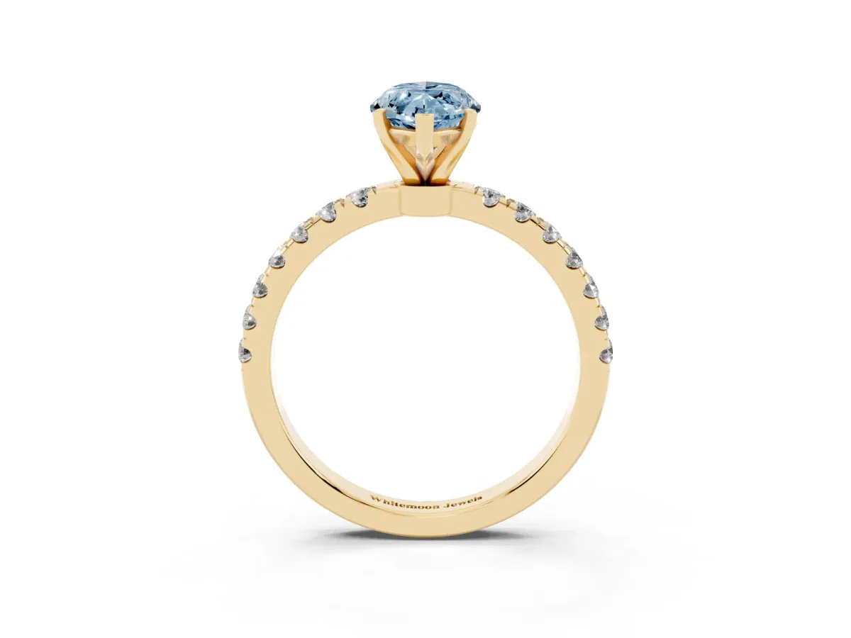 Fancy Blue Marquise Cut Diamond Solitaire Ring with Pavé Accents and Four-Prong Setting Yellow gold