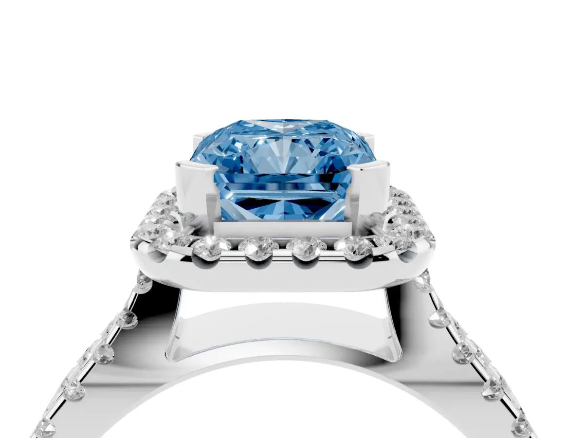 Fancy Blue Radiant Cut Diamond Halo Ring with Split Shank Pavé Band and Prong Setting Platinum