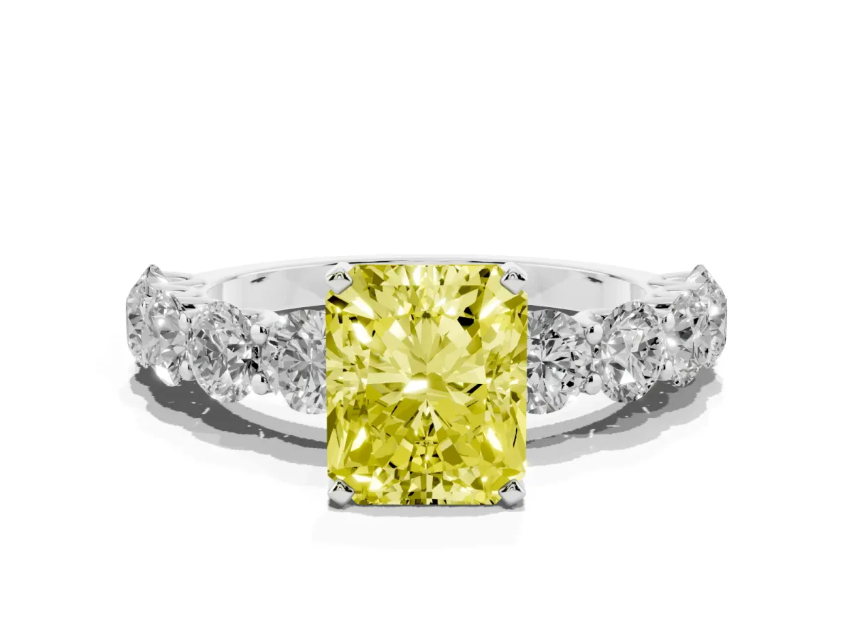 Fancy Yellow Radiant Cut Diamond Prong Setting with Side Stones on a Pave Band Silver