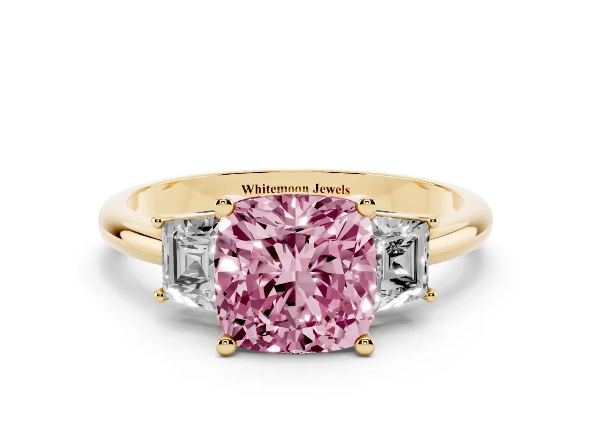 Fancy Pink Cushion Cut Diamond Three-Stone Ring with Trapezoid Side Stones and Prong Setting Yellow gold