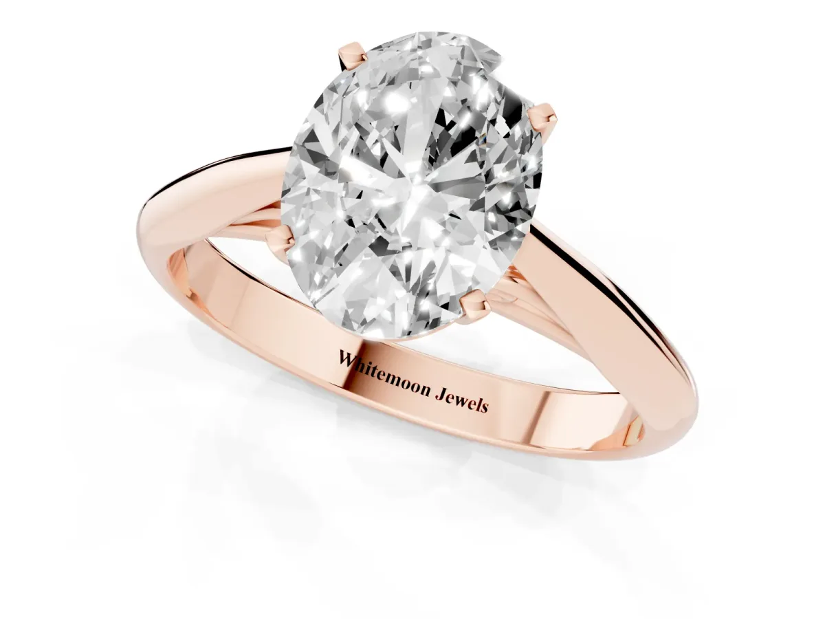 Oval Cut Diamond Solitaire Engagement Ring with Cathedral Setting and Four-Prong Mount Rose gold