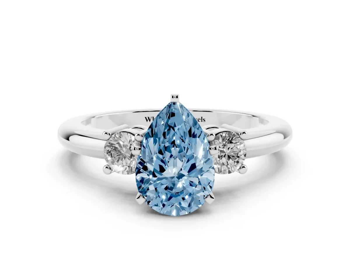 Fancy Blue Three-Stone Pear Cut Cut Diamond Solitaire with Prong Setting and Classic Band Silver
