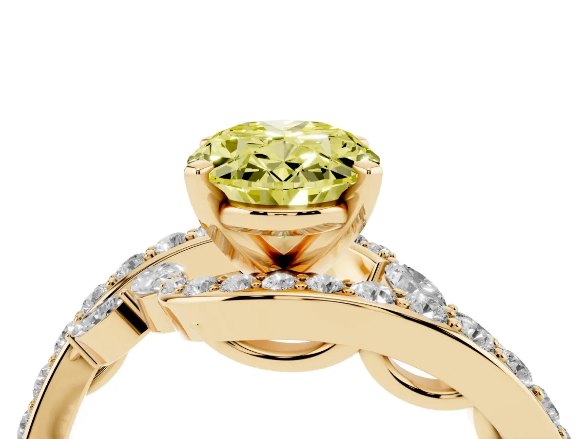 Fancy Yellow Oval Cut Solitaire with Pavé Twist Band and Four-Prong Setting Yellow gold