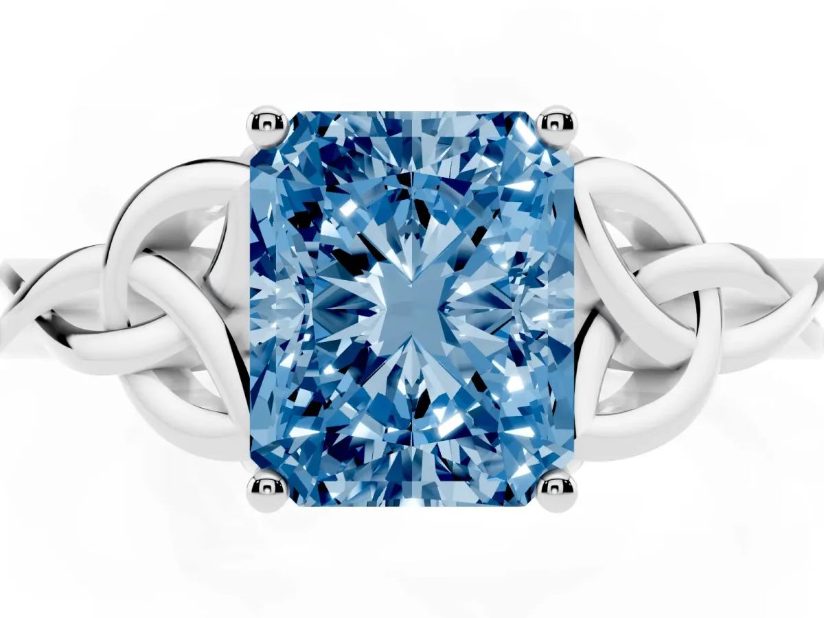 Fancy Blue Radiant Cut Diamond Solitaire Engagement Ring with Celtic Knot Band and Four-Prong Setting White gold