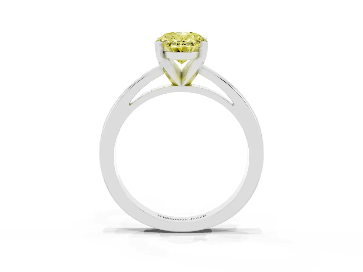 Fancy Yellow Oval Cut Solitaire Diamond Engagement Ring with Four-Prong Setting on a Classic Band Silver