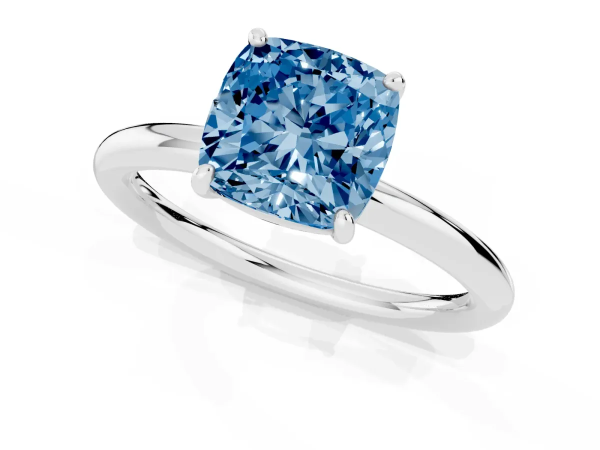 Fancy Blue Cushion Cut Solitaire Diamond Ring with Four-Prong Setting on a Plain Band White gold