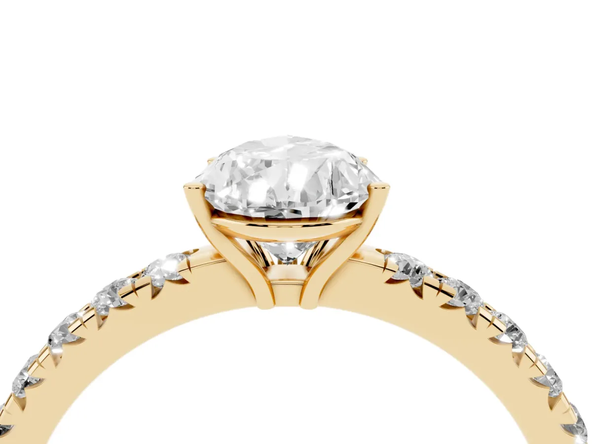 Pear Cut Diamond Pavé Solitaire Engagement Ring with Four-Prong Setting Yellow gold