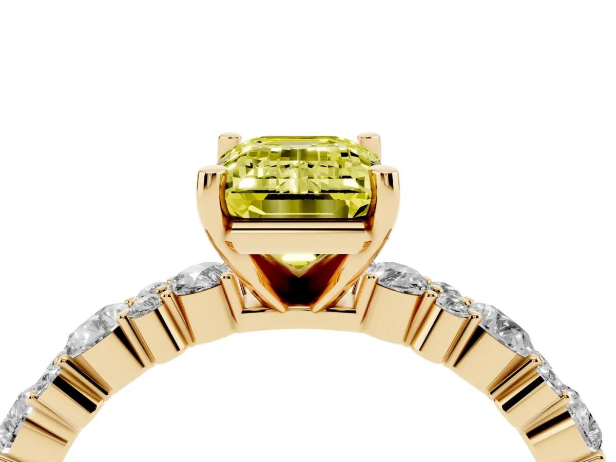 Fancy Yellow Emerald Cut Diamond Side Stone Solitaire Ring with Round and Four-Prong Setting Yellow gold