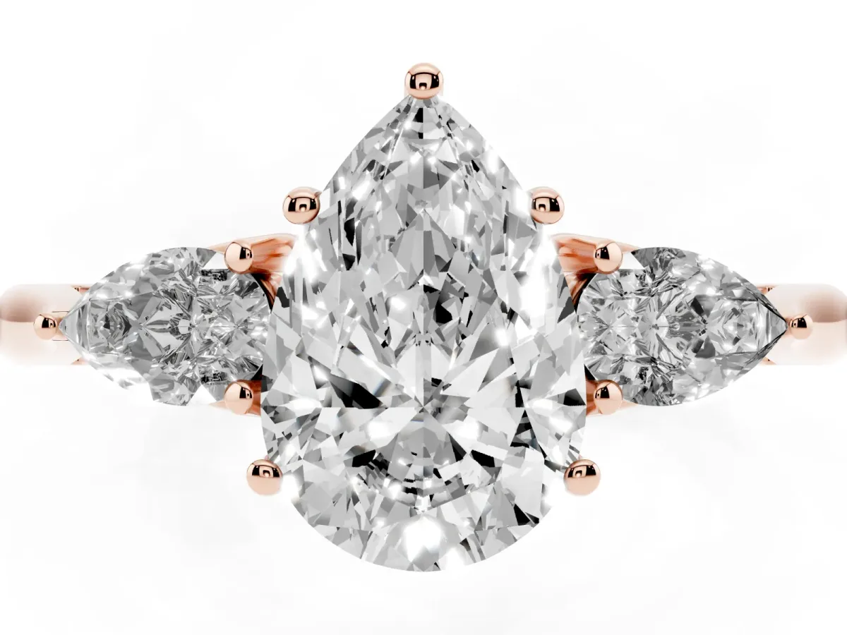 Pear Cut Diamond Three-Stone Ring with Pear Side Stones and Prong Setting Rose gold