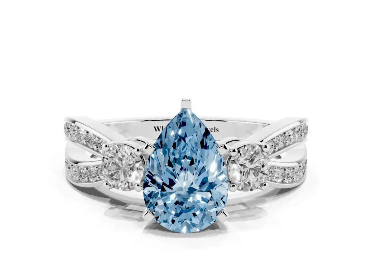 Fancy Blue Three-Stone Pear Cut Cut Diamond Twist Band with Prong Setting Platinum