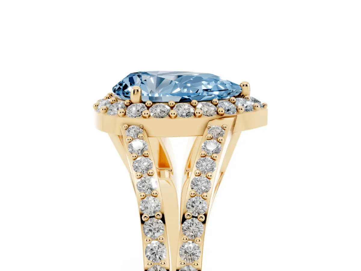 Fancy Blue Pear Cut Halo Split Shank Diamond Ring with Prong Setting Yellow gold