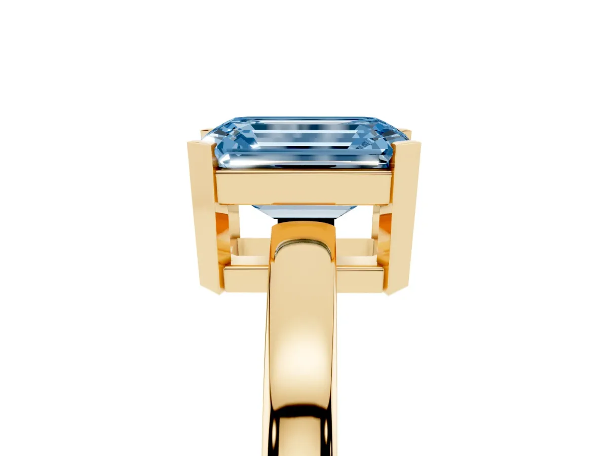 Fancy Blue Emerald Cut Cut Solitaire Ring with Four-Prong Setting and Classic Band Yellow gold