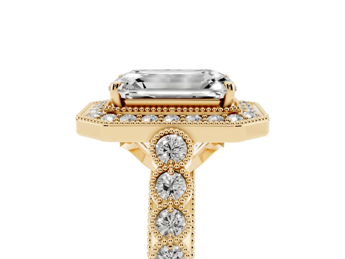 Emerald Cut Halo Milgrain Solitaire with Bezel Set Side Stones and Pave Band Yellow gold
