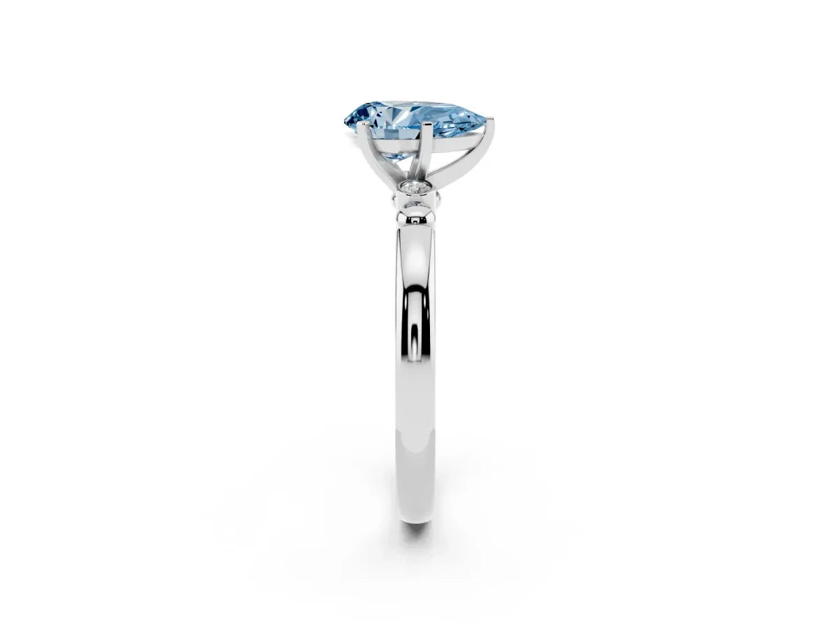 Fancy Blue Pear Cut Solitaire Beaded Band with Four-Prong Setting Silver