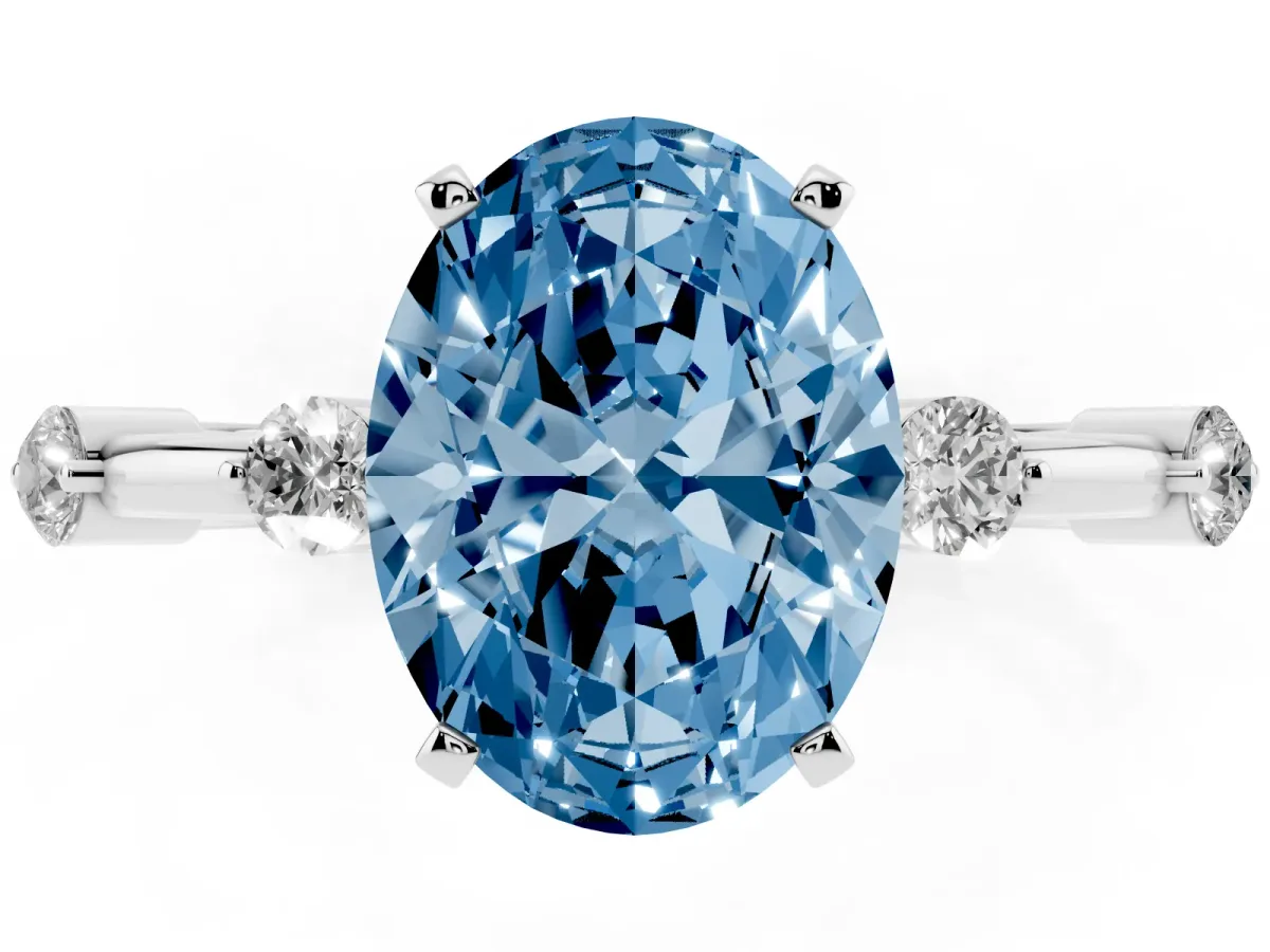 Fancy Blue Oval Cut Solitaire Diamond Ring with Bezel Set Side Stones and Prong Setting Silver