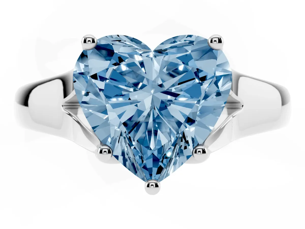 Fancy Blue Heart Cut Solitaire Diamond Ring with Cathedral Band and Four-Prong Setting Silver
