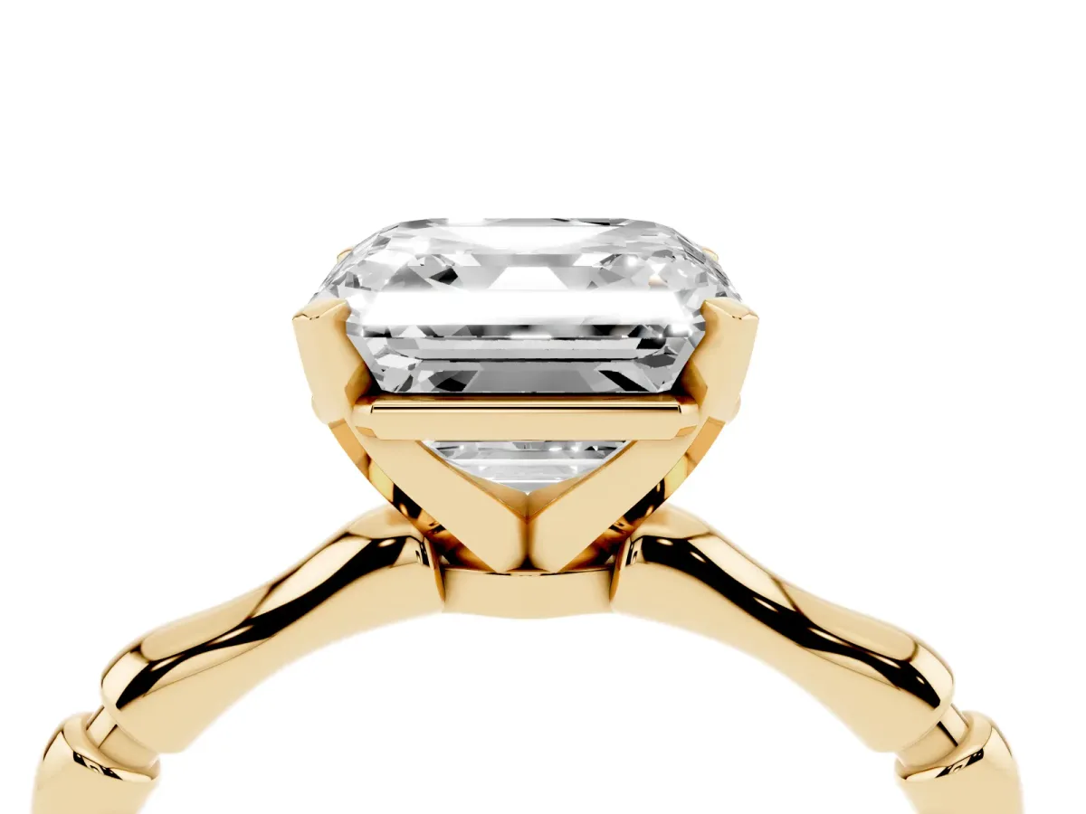 Asscher Cut Solitaire Diamond Ring with Bamboo Band and Four-Prong Setting Yellow gold