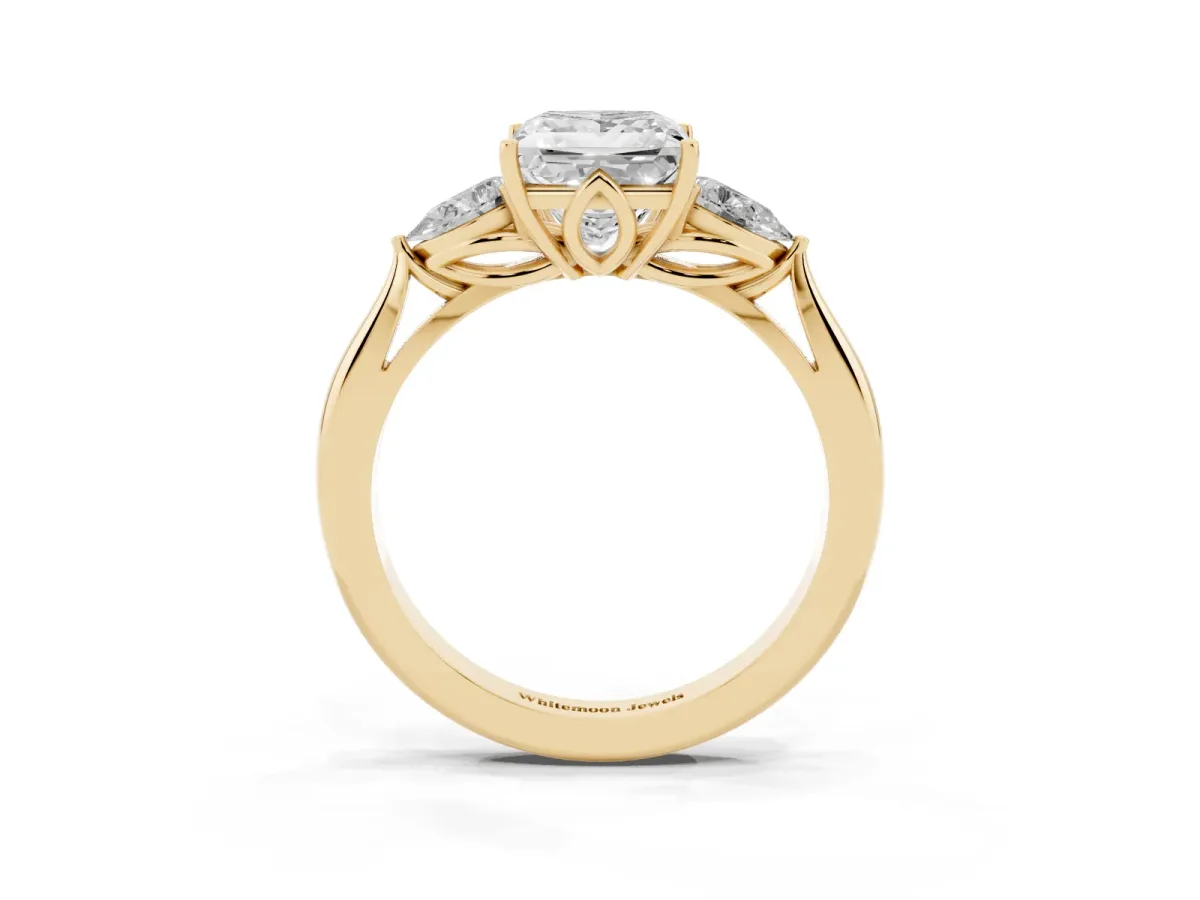 Three-Stone Princess Cut Diamond Ring with Pear Side Stones in Four-Prong Setting Yellow gold
