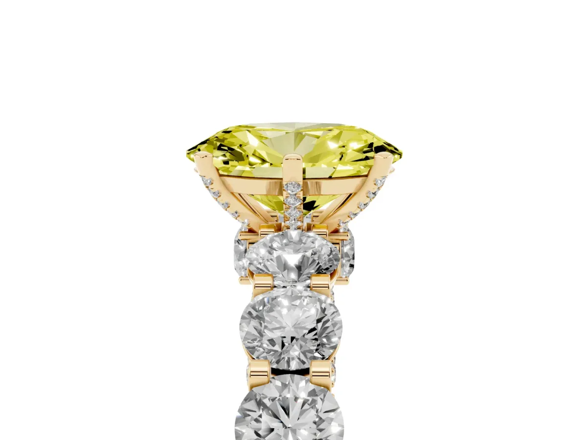 Fancy Yellow Oval Cut Diamond Side Stone Engagement Ring with Four-Prong Setting Yellow gold