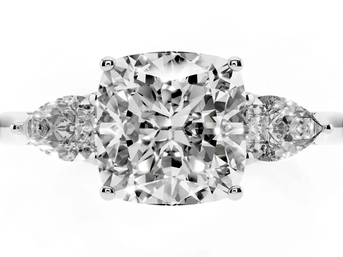 Three-Stone Cushion Cut Diamond Ring with Pear Side Stones in Four-Prong Setting Silver