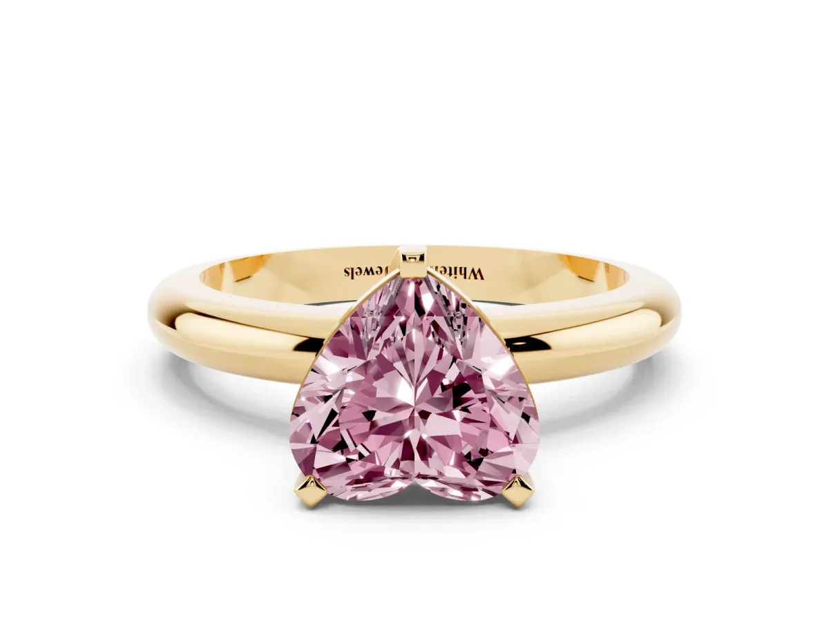 Fancy Pink Heart Cut Diamond Solitaire Engagement Ring with Round Band and Four-Prong Setting Yellow gold