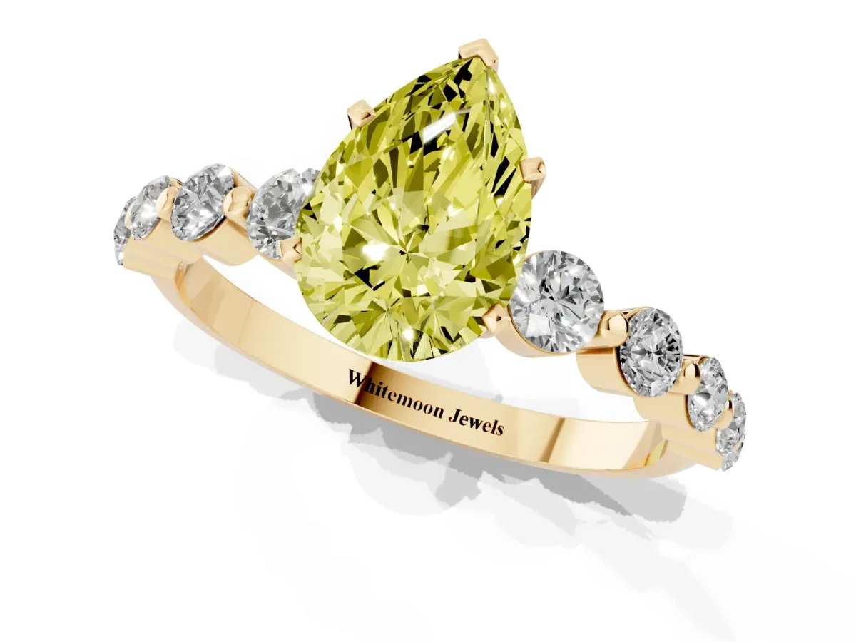 Fancy Yellow Pear Cut Solitaire Diamond Ring with Pave Band and Four-Prong Setting Yellow gold