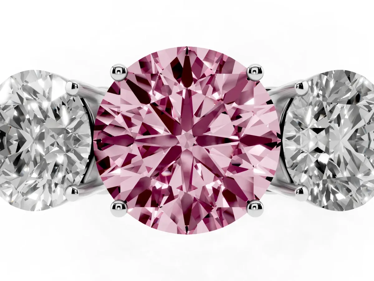 Fancy Pink Round Cut Diamond Three-Stone Ring with Prong Setting and Textured Band Platinum