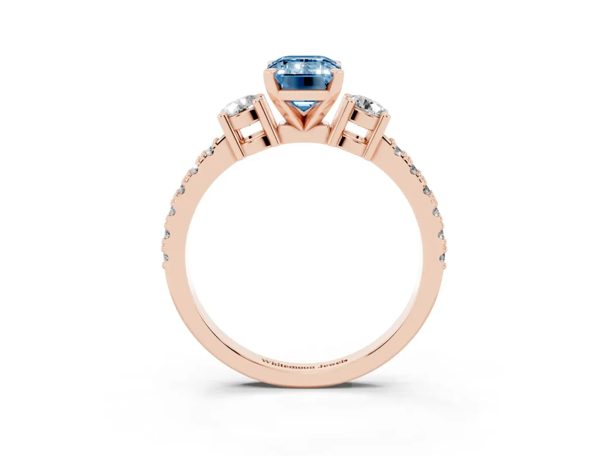 Fancy Blue Emerald Cut Three-Stone Diamond Pavé Band with Prong Setting Rose gold