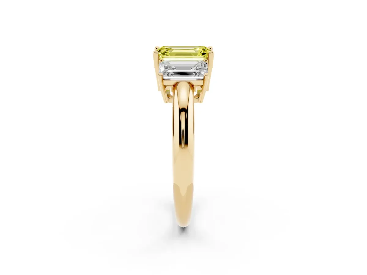 Fancy Yellow Three-Stone Emerald Cut Cut Diamond Engagement Ring with Prong Setting on a White Gold Band Yellow gold