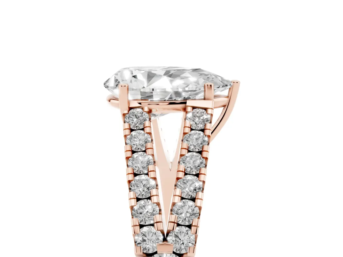 Pear Cut Diamond Split Shank Engagement Ring with Round Pavé and Prong Setting Rose gold