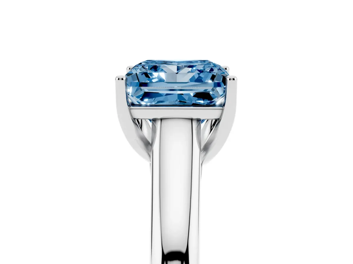 Fancy Blue Princess Cut Solitaire Engagement Ring with Tapered Band and Four-Prong Setting Silver