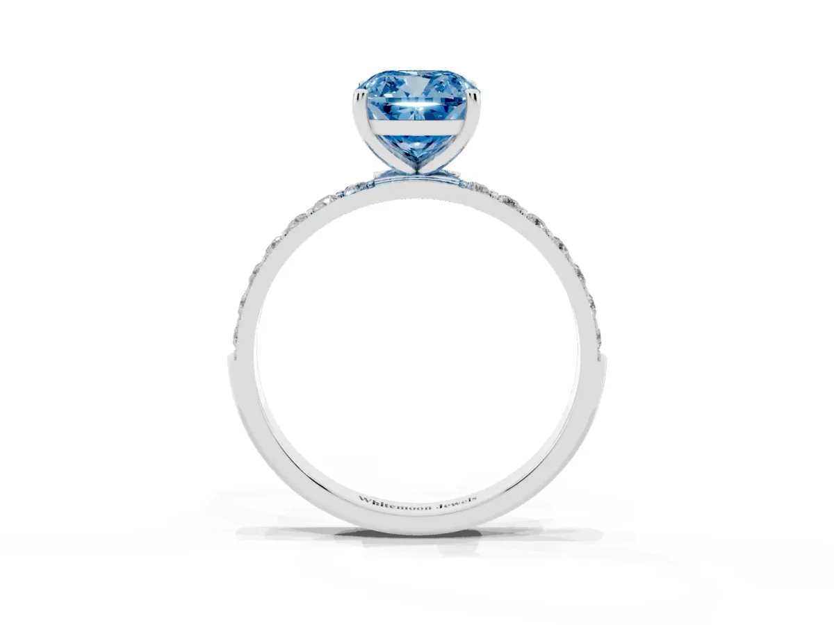 Fancy Blue Cushion Cut Diamond Solitaire Ring with Round Pavé Shoulders and Prong Setting Silver