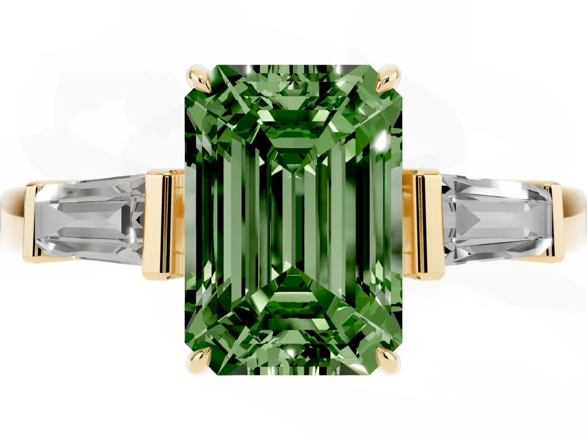 Fancy Green Emerald Cut Diamond Three-Stone Ring with Tapered Baguette Side Stones and Prong Setting Yellow gold
