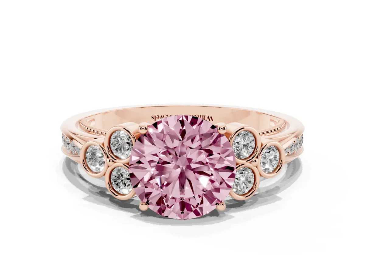 Fancy Pink Round Cut Cut Diamond Engagement Ring with Bezel Set Round Side Stones and Prong Setting Rose gold